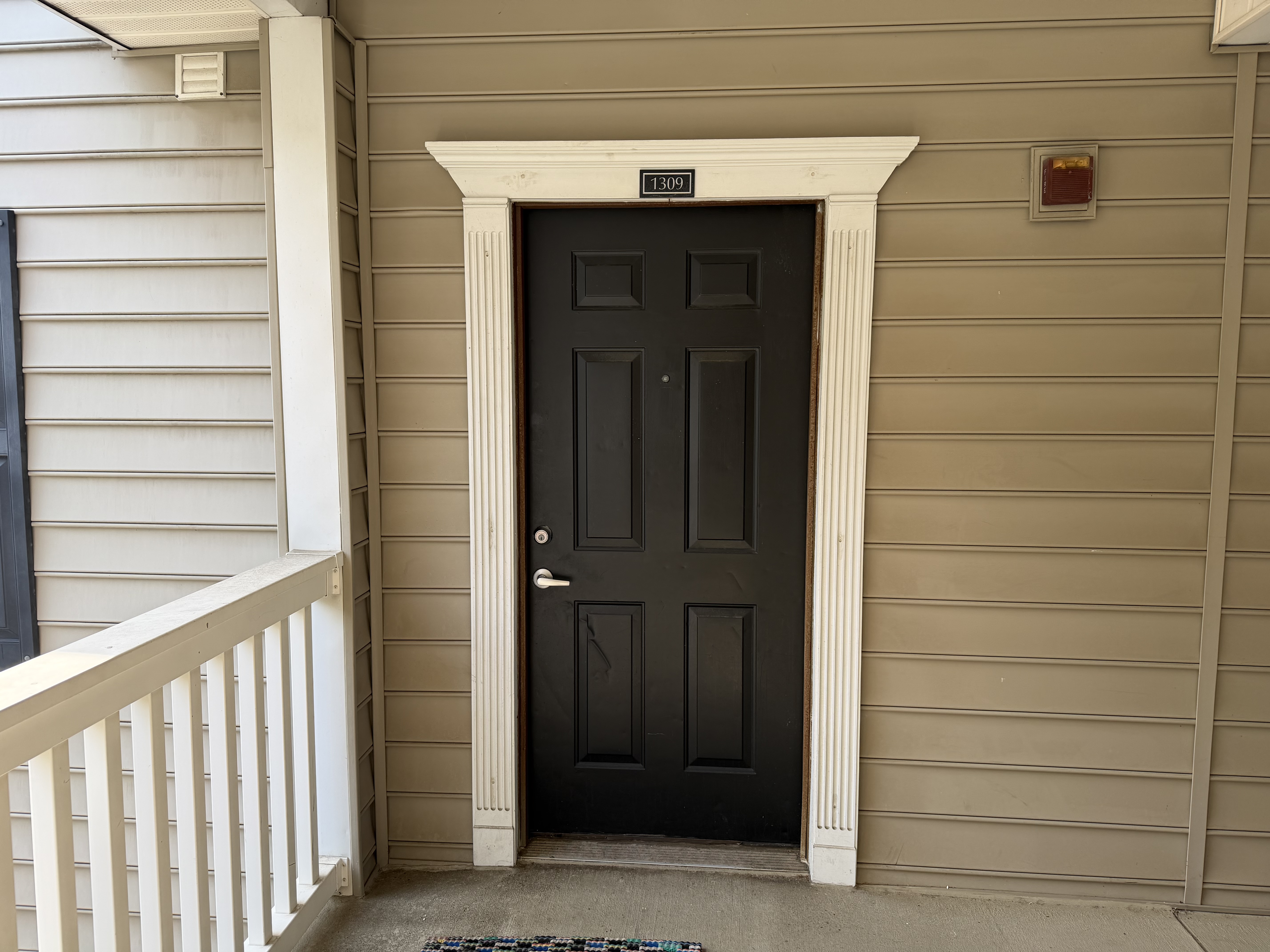 Alyssa's apartment door, but no Alyssa